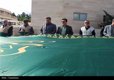 اهتزاز پرچم مطهر حرم رضوی در استانداری خراسان شمالی