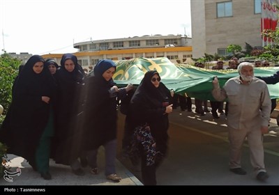اهتزاز پرچم مطهر حرم رضوی در استانداری خراسان شمالی