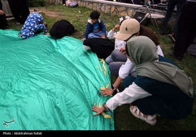 مراسم اهتزاز پرچم رضوی بر فراز همدان