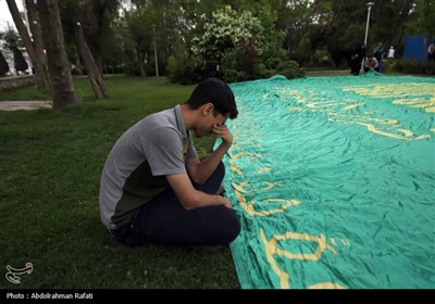 مراسم اهتزاز پرچم رضوی بر فراز همدان