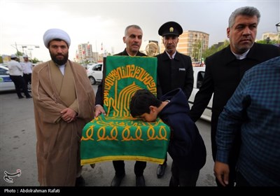 مراسم اهتزاز پرچم رضوی بر فراز همدان