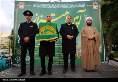 مراسم اهتزاز پرچم رضوی بر فراز همدان