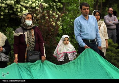 مراسم اهتزاز پرچم رضوی بر فراز همدان