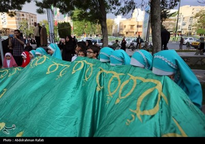 مراسم اهتزاز پرچم رضوی بر فراز همدان