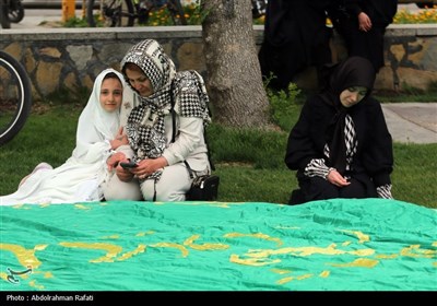 مراسم اهتزاز پرچم رضوی بر فراز همدان
