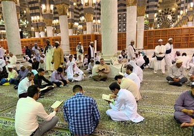 قرآن،شريفين،حرمين،زائران،كشيدن،سيگار،زيارت