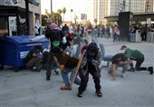 Riot Police Clash with Anti-ICE Protesters in LA after Immigration Raids