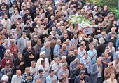 وداعی پرشور محمودآبادیها با شهید در زیر باران