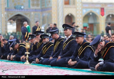 تعویض پرچم حرم مطهر حضرت معصومه (س)