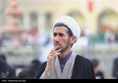 تعویض پرچم حرم مطهر حضرت معصومه (س)
