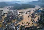 China Raises Compensation to Ease Tensions over Flood Diversions