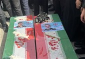الشهیدان حاجی زاده وباقری یُوارَیان الثرى بحضور رسمی واسع