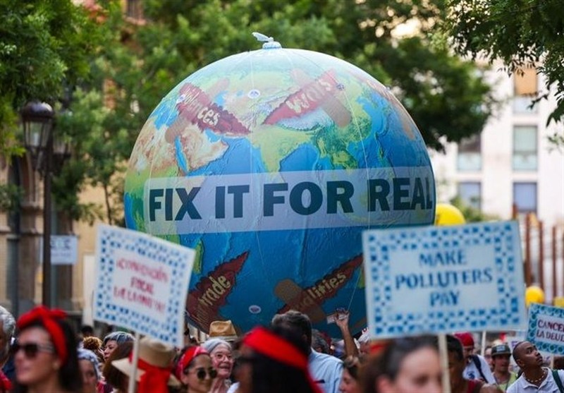 Protesters Demand Debt Cancellation, Climate Action Ahead of UN Summit