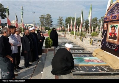 تجدید بیعت دفتر نظارت شورای نگهبان کاشان با شهدا- عکس صفحه ا ...
