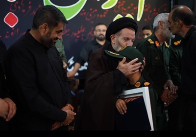 مراسم یادبود اربعین شهدای جنگ تحمیلی 12 روزه استان لرستان