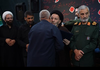 مراسم یادبود اربعین شهدای جنگ تحمیلی 12 روزه استان لرستان