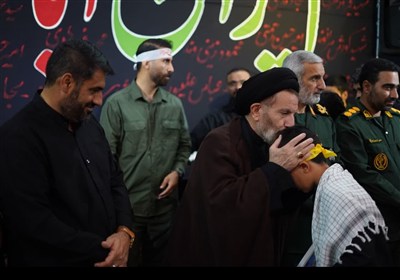 مراسم یادبود اربعین شهدای جنگ تحمیلی 12 روزه استان لرستان