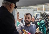 خدمة زوار الأربعین الحسینی فی النجف الأشرف تحت رایة الحرم الرضوی الشریف