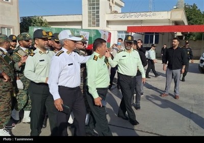 وداع جانسوز خانواده و همرزمان با پیکر شهید تولی