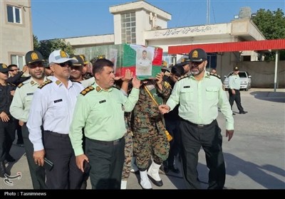وداع جانسوز خانواده و همرزمان با پیکر شهید تولی