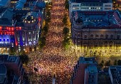 Tens of Thousands March in Serbia's Capital, Demand Snap Vote