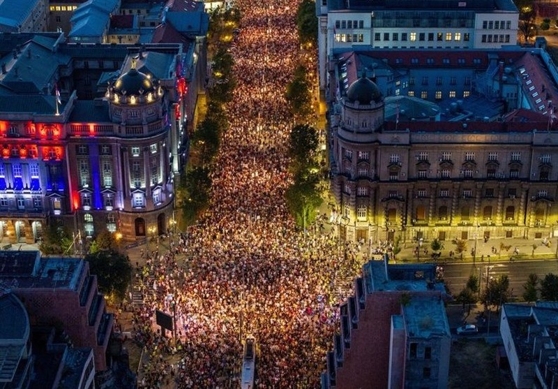 Tens of Thousands March in Serbia&apos;s Capital, Demand Snap Vote