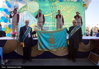 اهتزاز پرچم متبرک به نام حضرت مهدی (عج) بر فراز شهر همدان