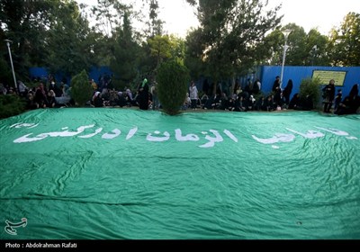 اهتزاز پرچم متبرک به نام حضرت مهدی (عج) بر فراز شهر همدان