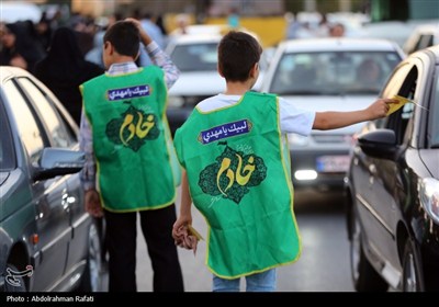 اهتزاز پرچم متبرک به نام حضرت مهدی (عج) بر فراز شهر همدان