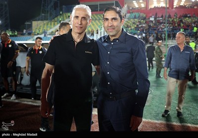 یحیی گل محمدی سرمربی تیم فوتبال فولاد خوزستان و وحید هاشمیان سرمربی تیم فوتبال پرسپولیس