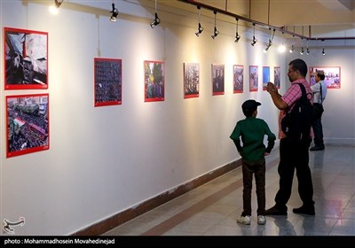 معرض صور &quot;12 یوماً من إیران&quot; بالعاصمة طهران.