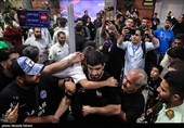 Heroes Return: Iranian Wrestling Champions Greeted by Throngs at Tehran Airport