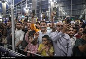 Heroes Return: Iranian Wrestling Champions Greeted by Throngs at Tehran Airport