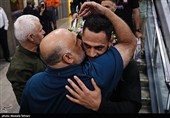 Heroes Return: Iranian Wrestling Champions Greeted by Throngs at Tehran Airport