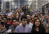 Heroes Return: Iranian Wrestling Champions Greeted by Throngs at Tehran Airport