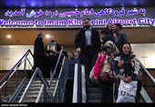 Heroes Return: Iranian Wrestling Champions Greeted by Throngs at Tehran Airport
