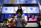 Heroes Return: Iranian Wrestling Champions Greeted by Throngs at Tehran Airport
