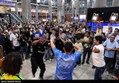 Heroes Return: Iranian Wrestling Champions Greeted by Throngs at Tehran Airport