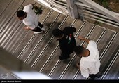 Heroes Return: Iranian Wrestling Champions Greeted by Throngs at Tehran Airport