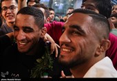 Heroes Return: Iranian Wrestling Champions Greeted by Throngs at Tehran Airport