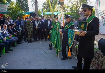تجدید میثاق خادمان حرم شاهچراغ (ع) با شهدا در روز مهمانی لاله‌ها