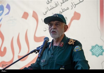 تجدید میثاق خادمان حرم شاهچراغ (ع) با شهدا در روز مهمانی لاله‌ها