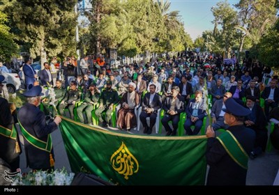 تجدید میثاق خادمان حرم شاهچراغ (ع) با شهدا در روز مهمانی لاله‌ها