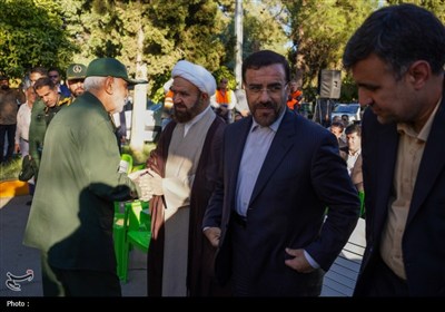 تجدید میثاق خادمان حرم شاهچراغ (ع) با شهدا در روز مهمانی لاله‌ها