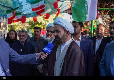 تجدید میثاق خادمان حرم شاهچراغ (ع) با شهدا در روز مهمانی لاله‌ها