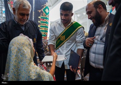 قهرمان کشتی جهان، خادم افتخاری حرم مطهر حضرت شاهچراغ (ع) شد