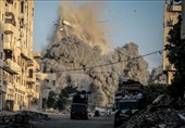 Israeli Strike Levels Gaza High-Rise, Drives Out Hundreds