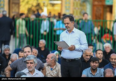 آیین تعویض پرچم گنبد حرم مطهر حضرت معصومه (س)