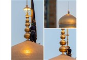 تعویض پرچم گنبد منور رضوی در آستانه شهادت حضرت زهرا (س)